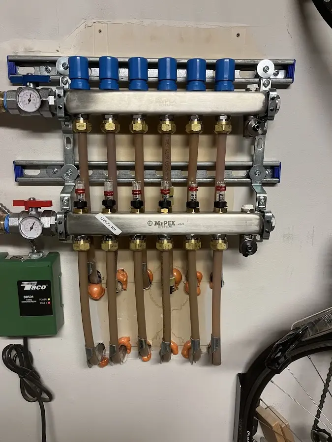 Plumber performing Leak Detection at a residential property in Bigfork